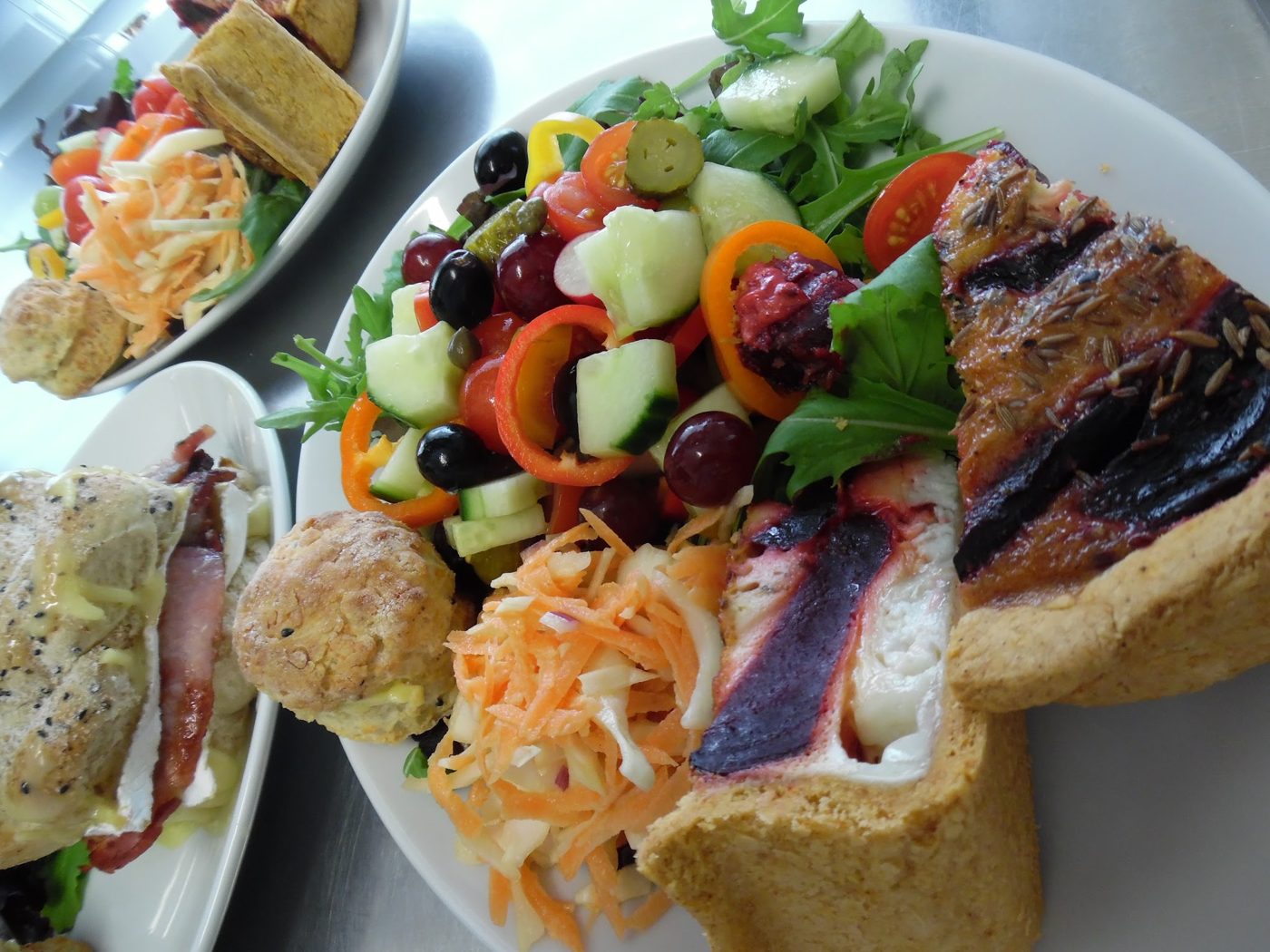 Plates of quiche and salad